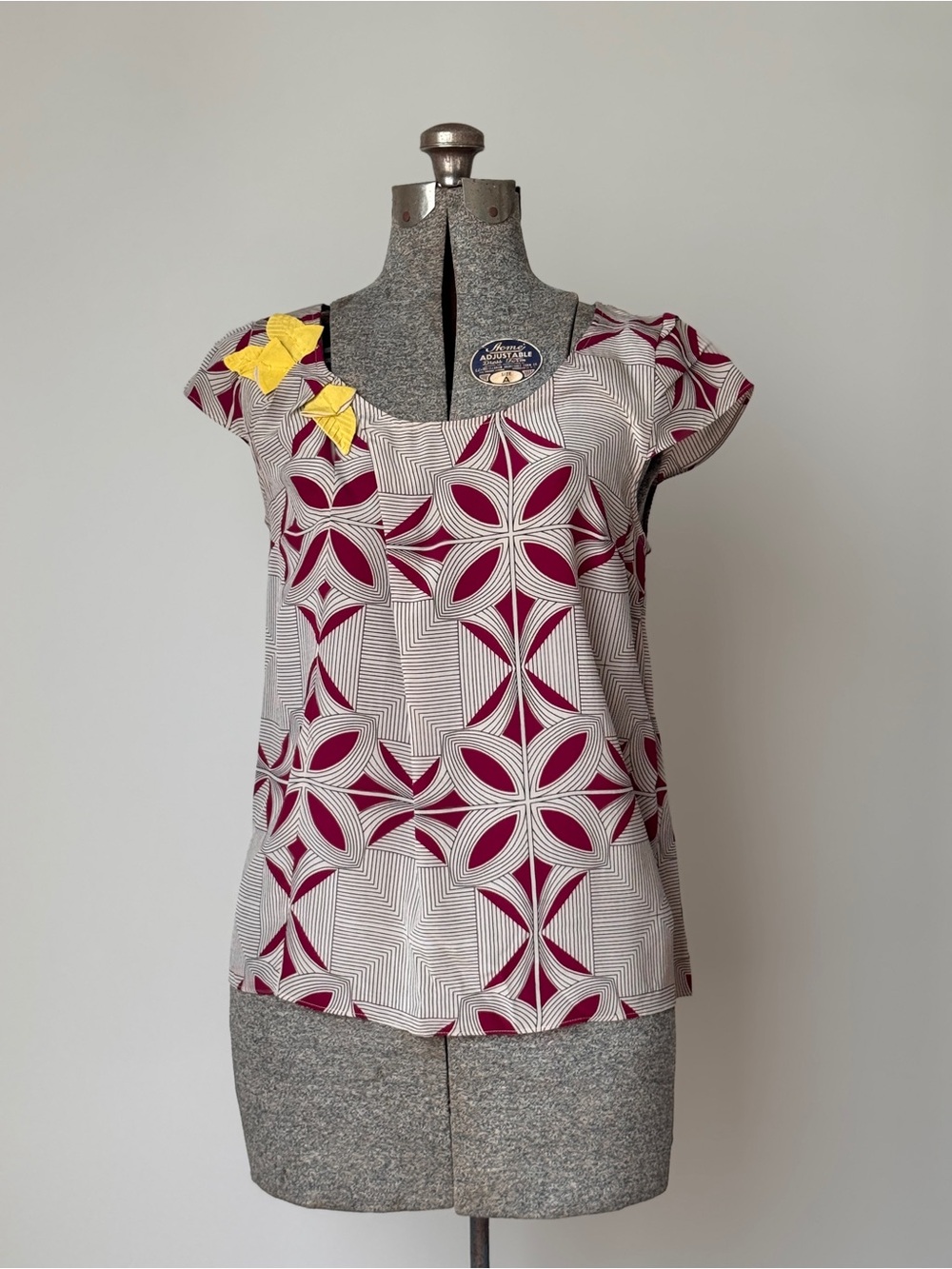 Floreat Anthropologie Burgundy and White Geometric Cap-Sleeve Silk Top
